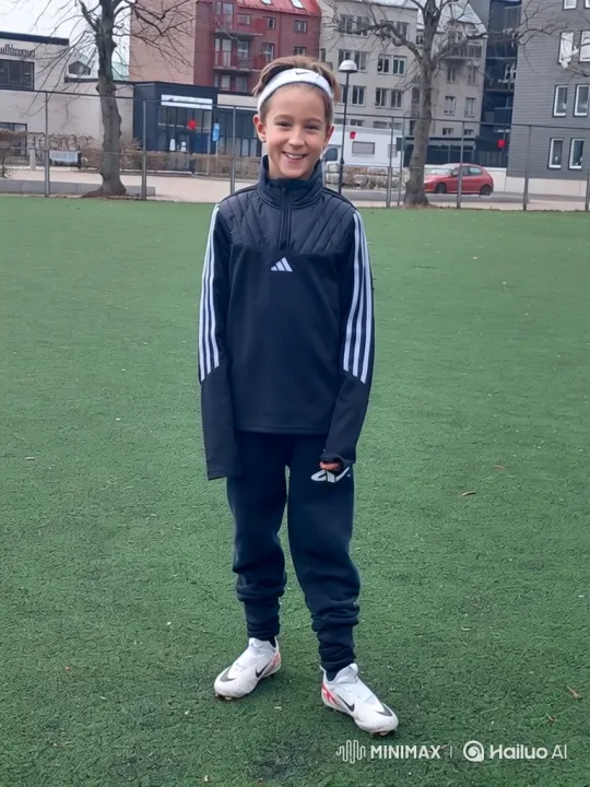 Young Soccer Player's Victory Celebration on Artificial Turf – AI Generated Video | Hailuo AI