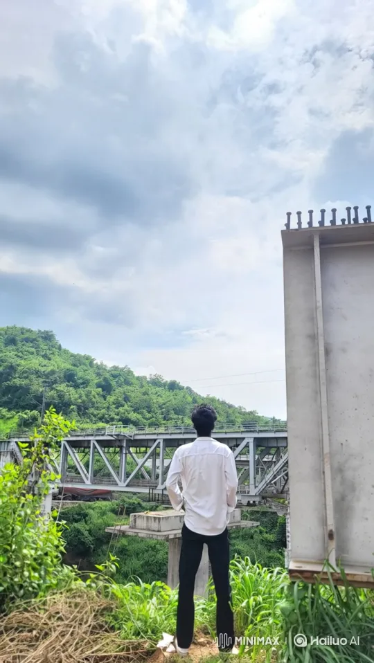 Panoramic Zoom Out from Man at Bridge to Earth in Space – AI Generated Video | Hailuo AI