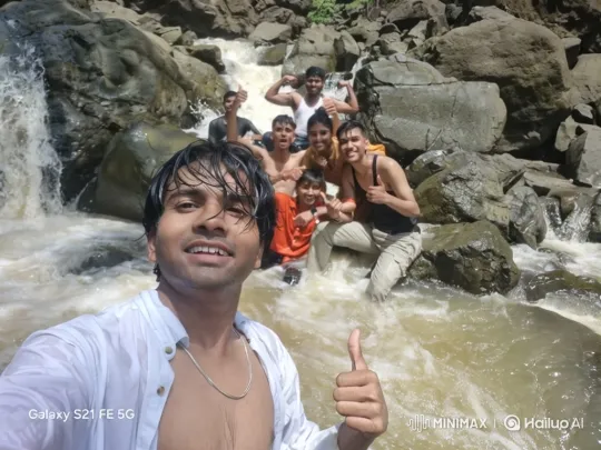 Joyful Friends by a Waterfall to Earth's Overview – AI Generated Video | Hailuo AI