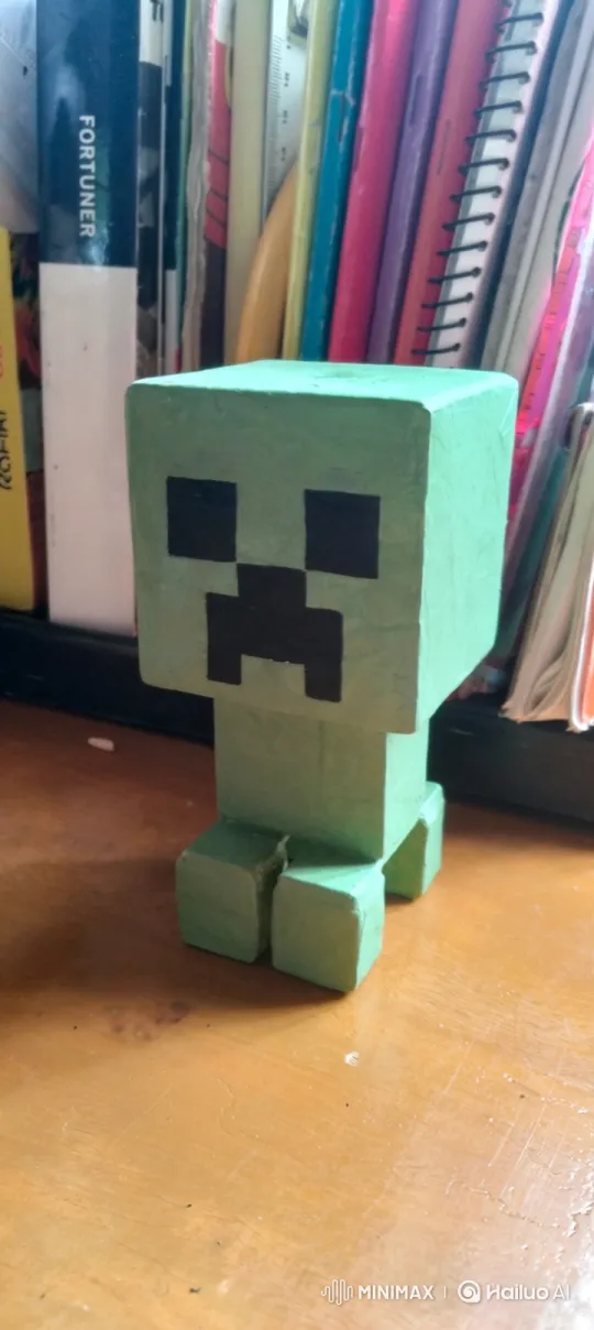 Minecraft Creeper Figurine Explodes on Desk – AI Generated Video | Hailuo AI