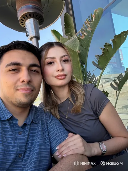 Young Family Embraces in Sunlit Patio Scene – AI Generated Video | Hailuo AI
