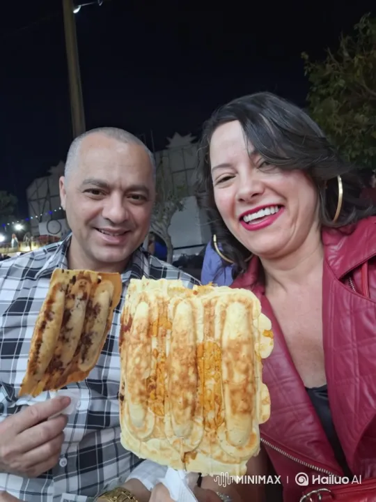 Couple Shares Joyful Moment at Night Festival – AI Generated Video | Hailuo AI