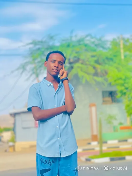 Stylish Young Man in Thoughtful Pose on Sunny Sidewalk – AI Generated Video | Hailuo AI