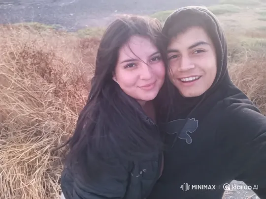 Family Embrace Captured on Beach During Sunset – AI Generated Video | Hailuo AI