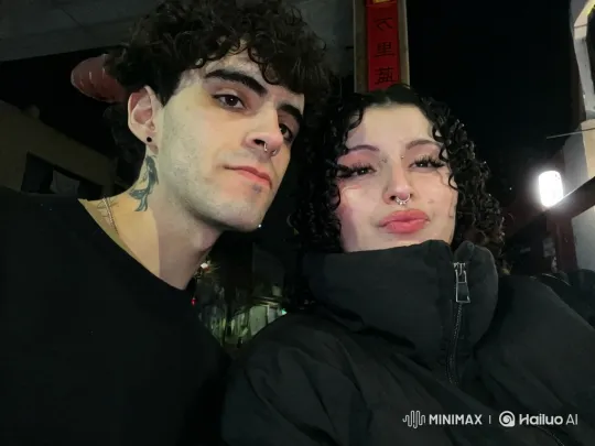 Young Couple and Their Child Embrace in Nighttime Setting – AI Generated Video | Hailuo AI