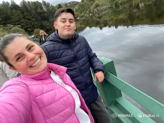 Family Embrace by a Calm Lake – AI Generated Video | Hailuo AI
