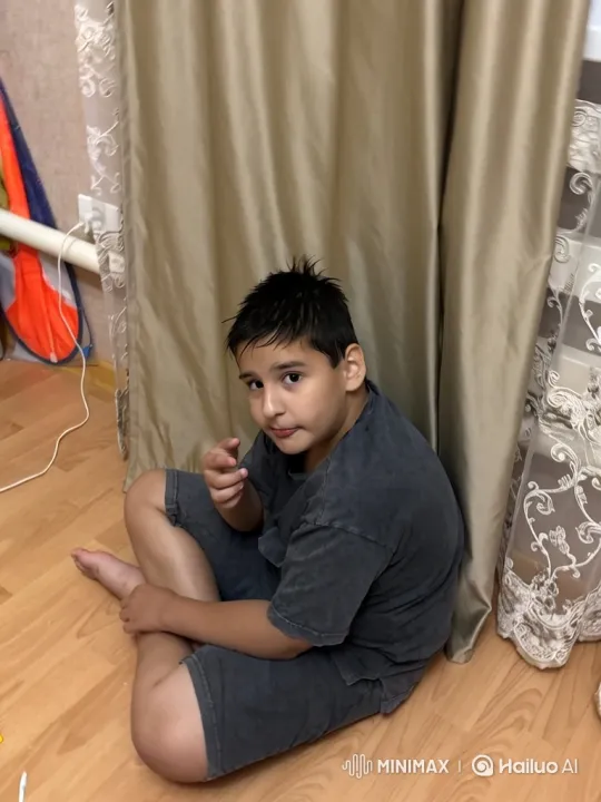Young Boy Striking a Confident Pose and Taking Off Clothes – AI Generated Video | Hailuo AI