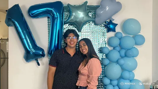 Young Couple Embraces Daughter at Joyful Party Scene – AI Generated Video | Hailuo AI