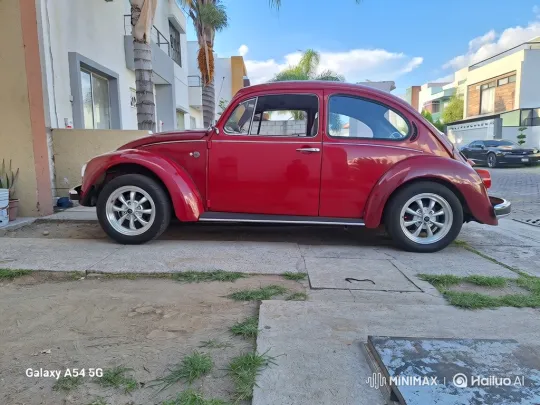 Classic Red Beetle Drives Through Residential Street – AI Generated Video | Hailuo AI