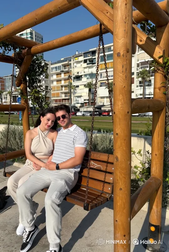 Young Family's Intimate Evening Swing Hug – AI Generated Video | Hailuo AI