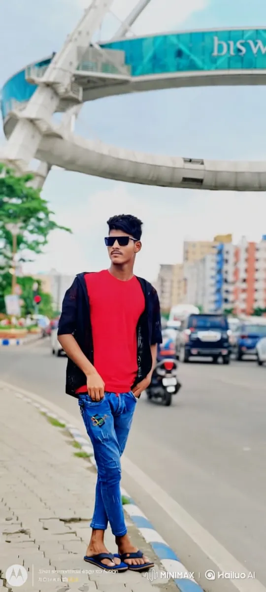 Young Man Poses on Urban Sidewalk with City Life Background – AI Generated Video | Hailuo AI
