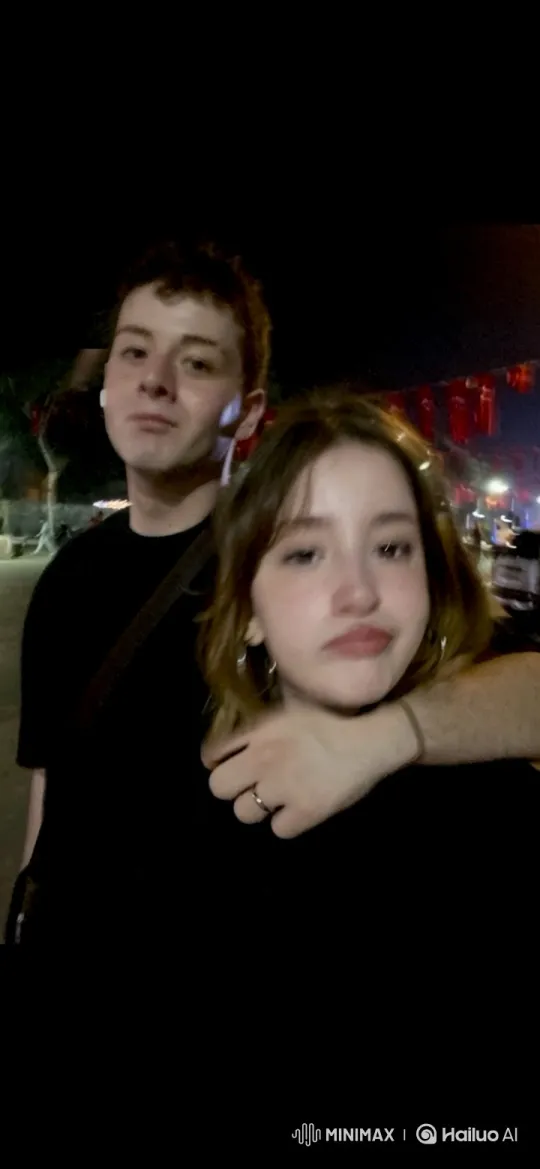 Young Couple and Child Embrace in Park Video – AI Generated Video | Hailuo AI