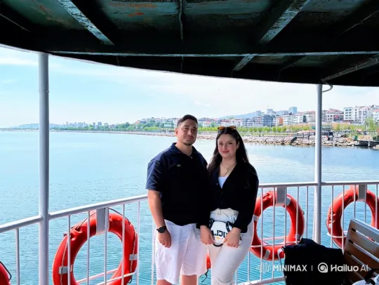 Family Embrace on Boat with City Skyline Background – AI Generated Video | Hailuo AI