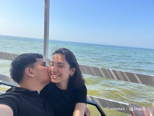 Family Embrace on a Sunny Seaside Deck – AI Generated Video | Hailuo AI