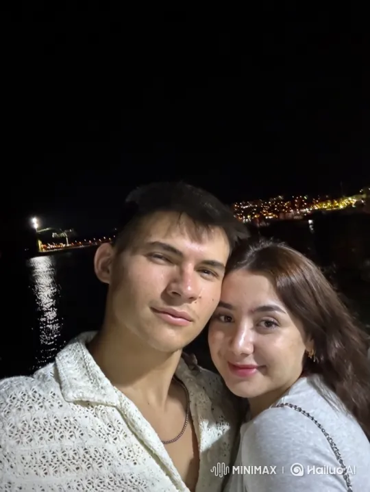 Young Couple and Daughter's Tender Nighttime Embrace – AI Generated Video | Hailuo AI