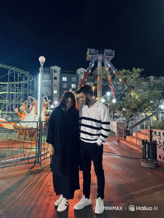 Family Reunion and Joyful Embrace at Night Amusement Park – AI Generated Video | Hailuo AI
