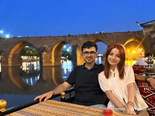 Family Harmony by the Ancient Bridge at Dusk – AI Generated Video | Hailuo AI