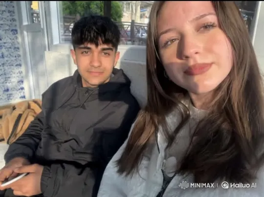 Family Reunion: Couple and Son Embrace on Bench – AI Generated Video | Hailuo AI