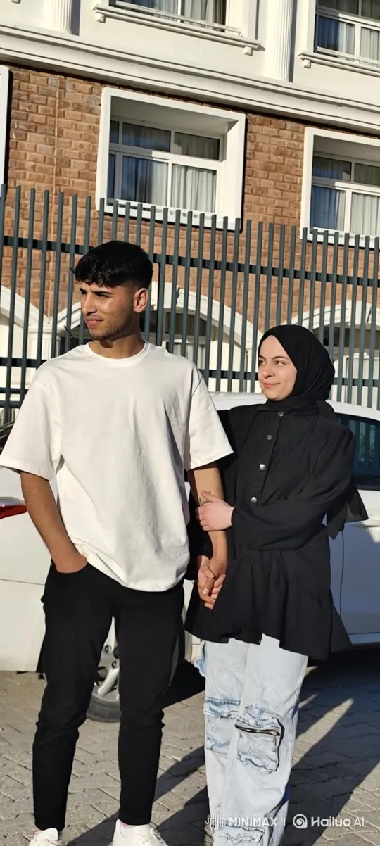 Young Couple's Tender Moment in Sunlit Outdoor Setting – AI Generated Video | Hailuo AI