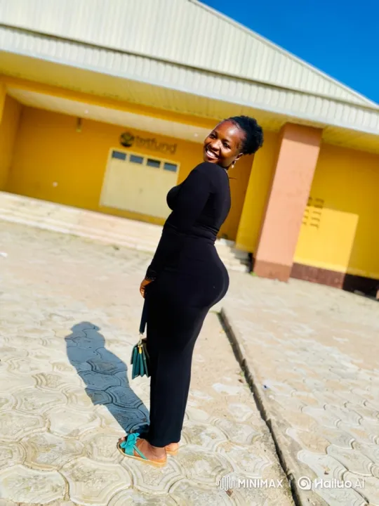 Woman Dances Joyfully in Black Dress Outdoors – AI Generated Video | Hailuo AI