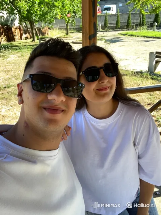 Family Embraces in Park During Summer Evening – AI Generated Video | Hailuo AI