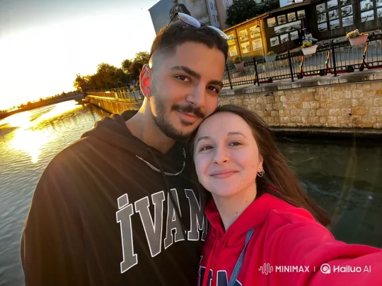 Family Embrace by Canal at Sunset – AI Generated Video | Hailuo AI