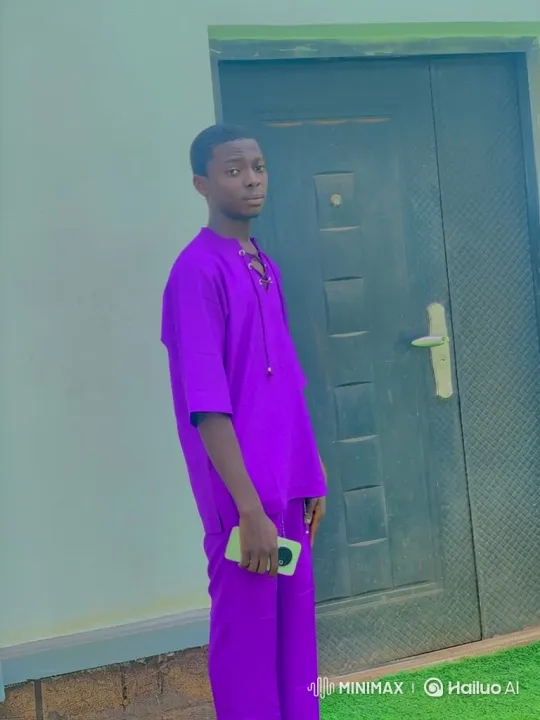 Young Man in Purple Suit with Smartphone – AI Generated Video | Hailuo AI