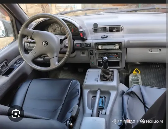 Woman Starts Older Nissan, Engine Idles with Smoke – AI Generated Video | Hailuo AI