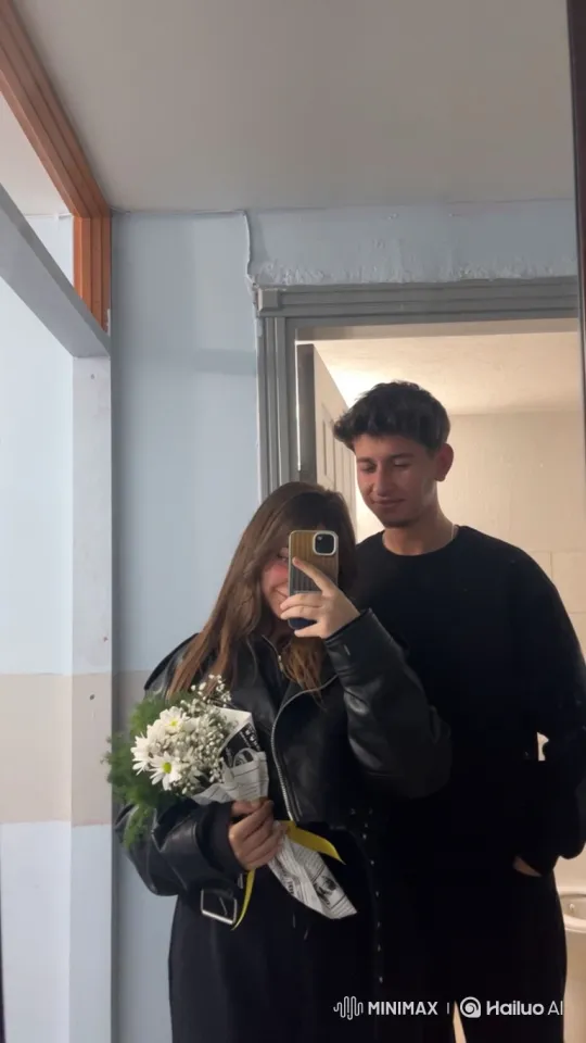 Young Couple Takes Selfie Mirror Shot with Toddler's Surprise Appearance – AI Generated Video | Hailuo AI