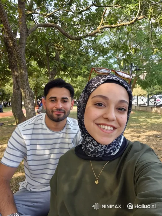 Family Embraces in Park During Summer Evening – AI Generated Video | Hailuo AI