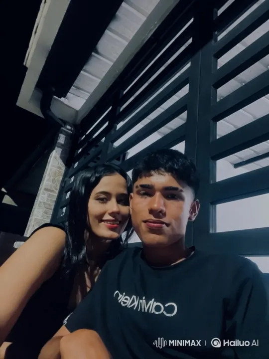 Family Embrace: Couple and Child Share Tender Moment – AI Generated Video | Hailuo AI
