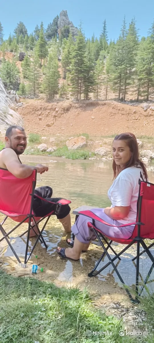 Family Enjoying a Peaceful Day by a Stream – AI Generated Video | Hailuo AI