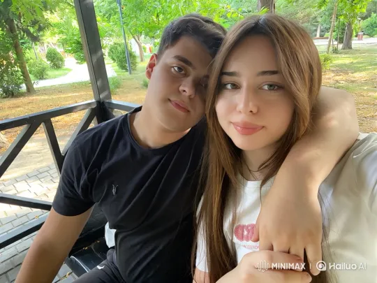 Young Family's Intimate Park Bench Moment – AI Generated Video | Hailuo AI