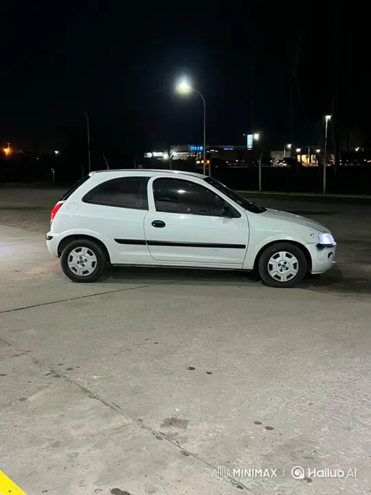 White Hatchback Lowering Its Suspension at Night – AI Generated Video | Hailuo AI