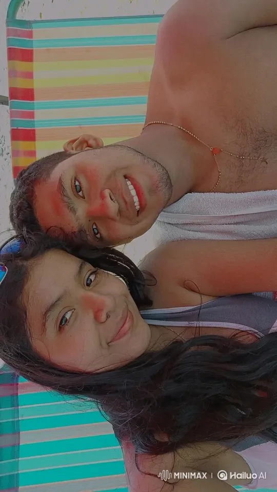 Family Embrace on a Sunny Beach – AI Generated Video | Hailuo AI