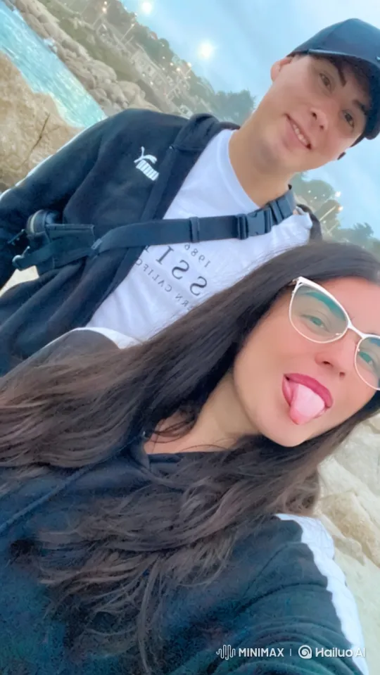 Family Moment Captured on Rocky Beach at Dusk – AI Generated Video | Hailuo AI