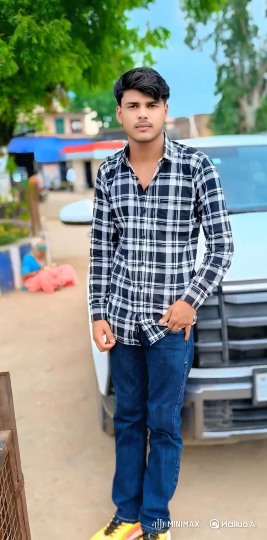 Young Man Poses for Camera, Gradually Smiles – AI Generated Video | Hailuo AI