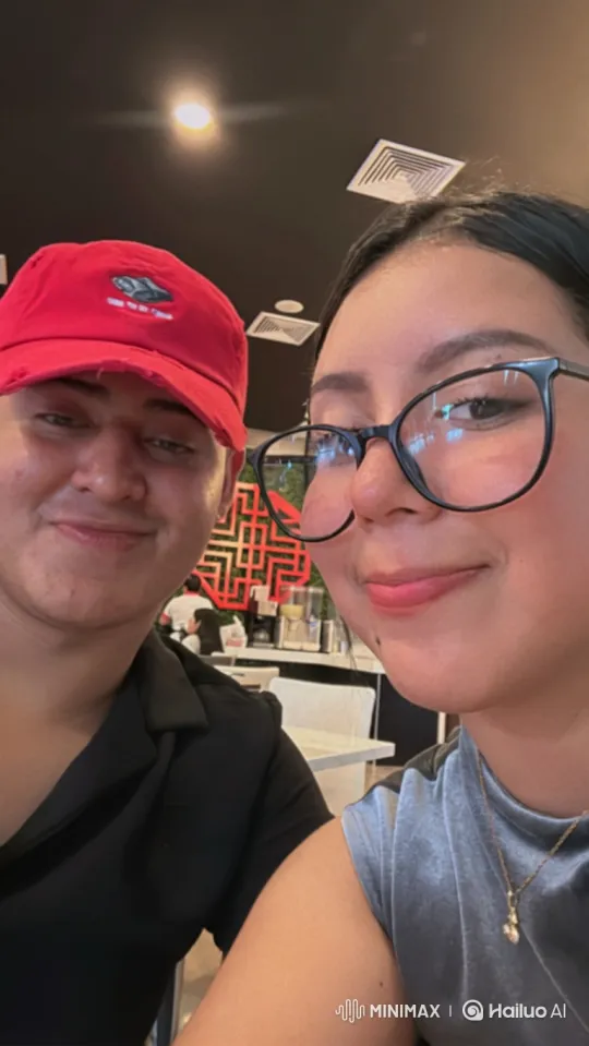 Family Embrace in Sunlit Town Square – AI Generated Video | Hailuo AI