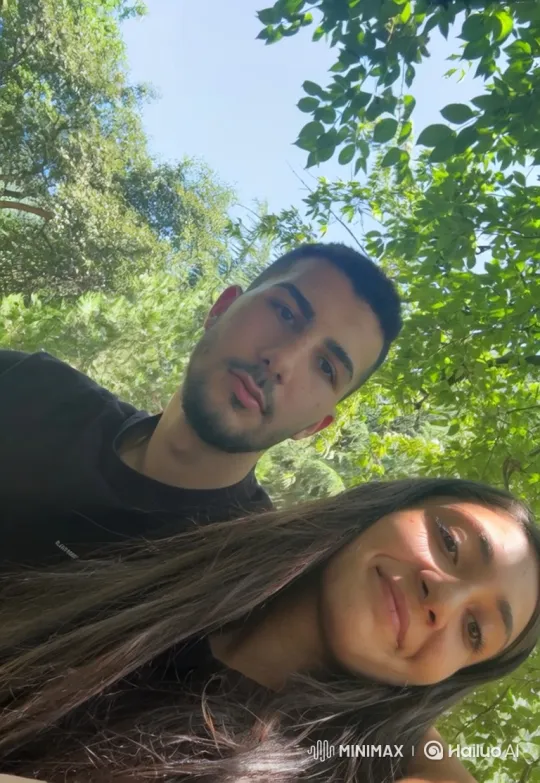 Family Embrace in Sunlit Outdoor Setting – AI Generated Video | Hailuo AI