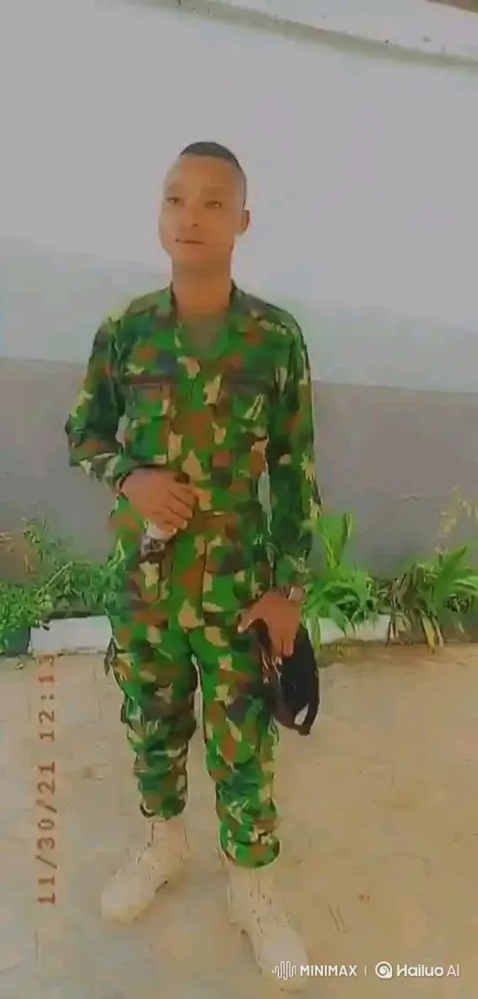 Man in Camouflage Uniform Walks with Tracking Camera – AI Generated Video | Hailuo AI