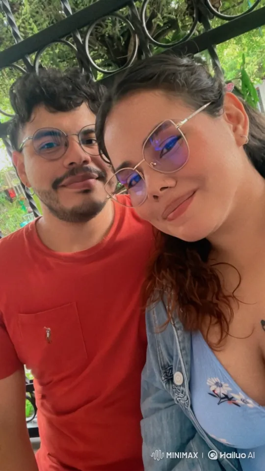 Young Family Embraces in Sunlit Park – AI Generated Video | Hailuo AI