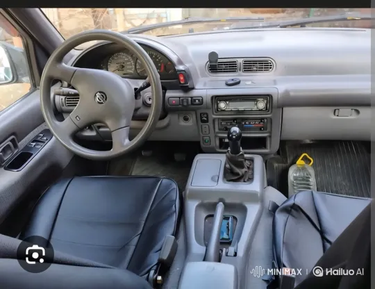 Woman Shifts Gears in Classic Nissan Car – AI Generated Video | Hailuo AI