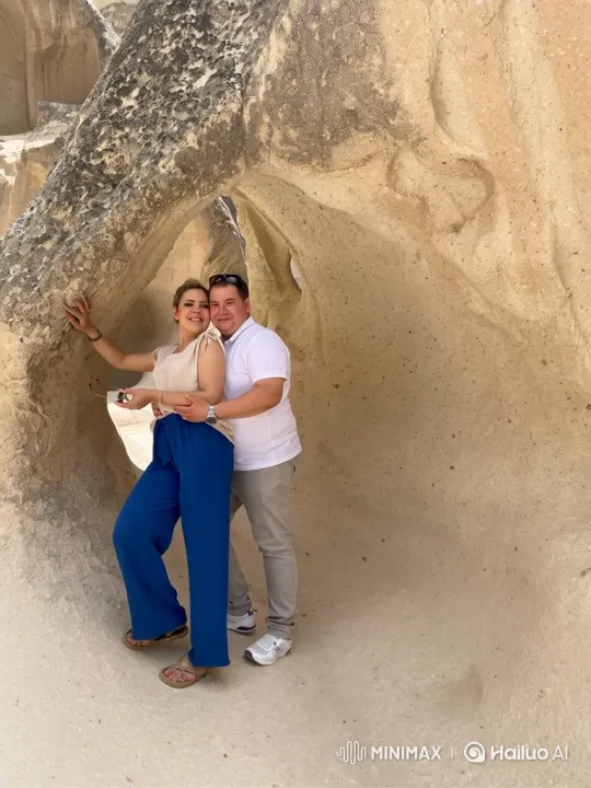 Family Embrace in Sunlit Rock Formation – AI Generated Video | Hailuo AI