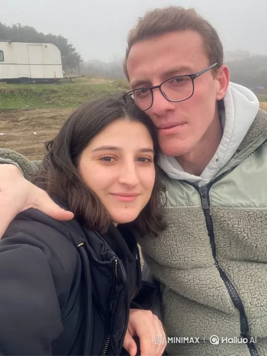 Young Family Embraces Child in Foggy Outdoor Setting – AI Generated Video | Hailuo AI