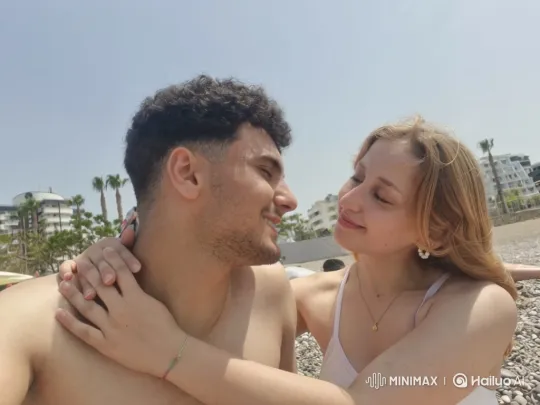 Young Family's Intimate Beach Embrace Captured – AI Generated Video | Hailuo AI
