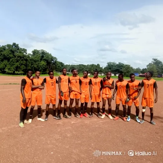 Youth Sports Team Poses on Dirt Field – AI Generated Video | Hailuo AI