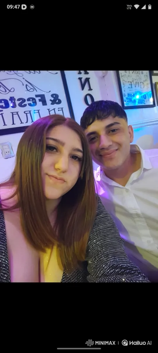 Couple and Child Captured in Intimate, Joyful Home Video – AI Generated Video | Hailuo AI