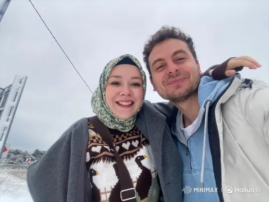 Couple and Baby Enjoying Snowy and Cozy Moments – AI Generated Video | Hailuo AI
