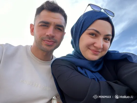 Family Embrace Captured in Intimate Vertical Video – AI Generated Video | Hailuo AI
