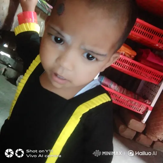 Close-up of a Curious Child with Inquisitive Eyes – AI Generated Video | Hailuo AI